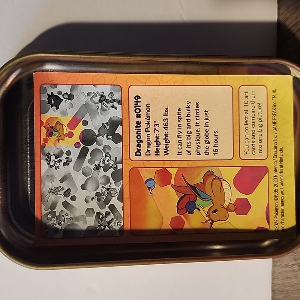 Pokemon Gold and Brown Tin with Dragonite Design - Picture 2 of 2